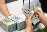 Tiền gửi tại một ngân hàng giảm hơn 7.000 tỷ đồng trong một quý, lợi nhuận đi ngang do trích lập dự phòng tăng vọt